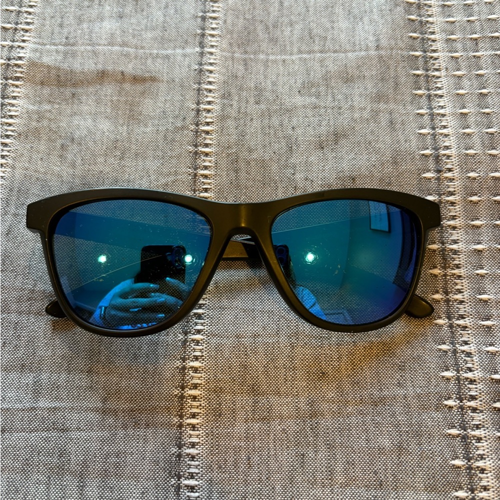 Oakley Stylish Black Sunglasses with Blue Lenses